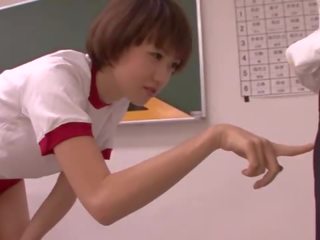 Young oriental Ms blowing teacher