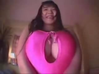Busty oriental asian young woman temptation